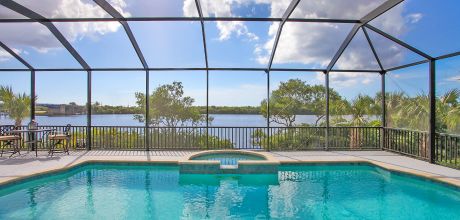 Deluxe-Villa Manasota Beach 42031 mit beheizbarem Pool & Whirlpool und herrlichem Blick auf die Bay in Strandnähe (ca. 800m), Grundstück ca. 1.500 qm, Wohnfläche ca. 250qm, Wechseltag flexibel – Mindestmietzeit 1 Woche.