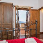 Ferienhaus Kreta KV33272 Schlafraum mit Zugang zum Balkon